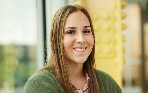 portrait of young girl scout alum smiling